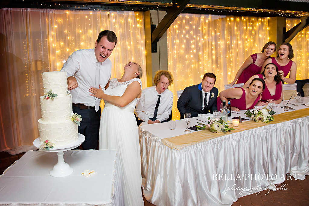 raffertys resort wedding reception cake cutting 