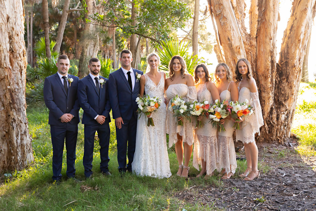 bridal party caves beach wedding photos