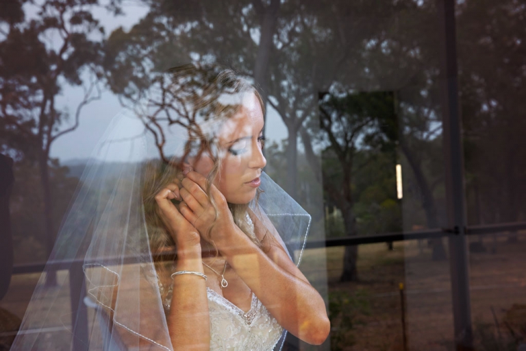 bride getting ready at eco cabins glenworth valley