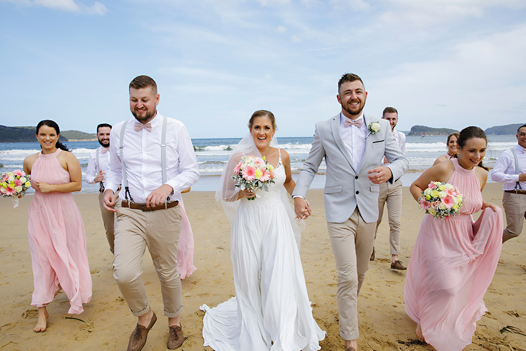 fun wedding photos ocean beach bridal party 