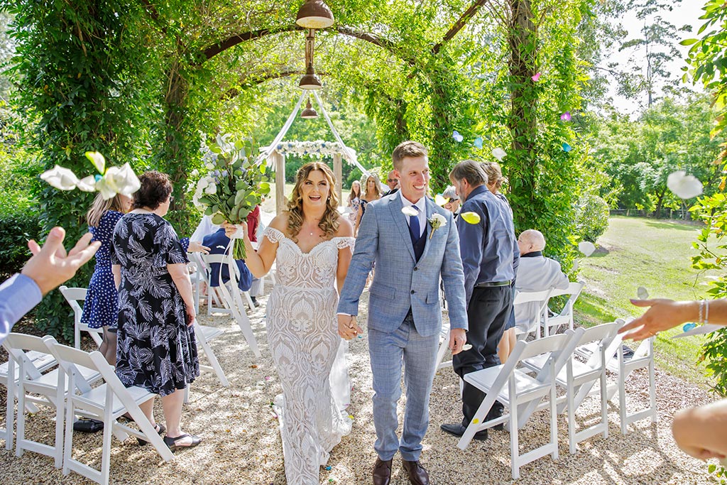 married walking up the aisle fernbank arbor