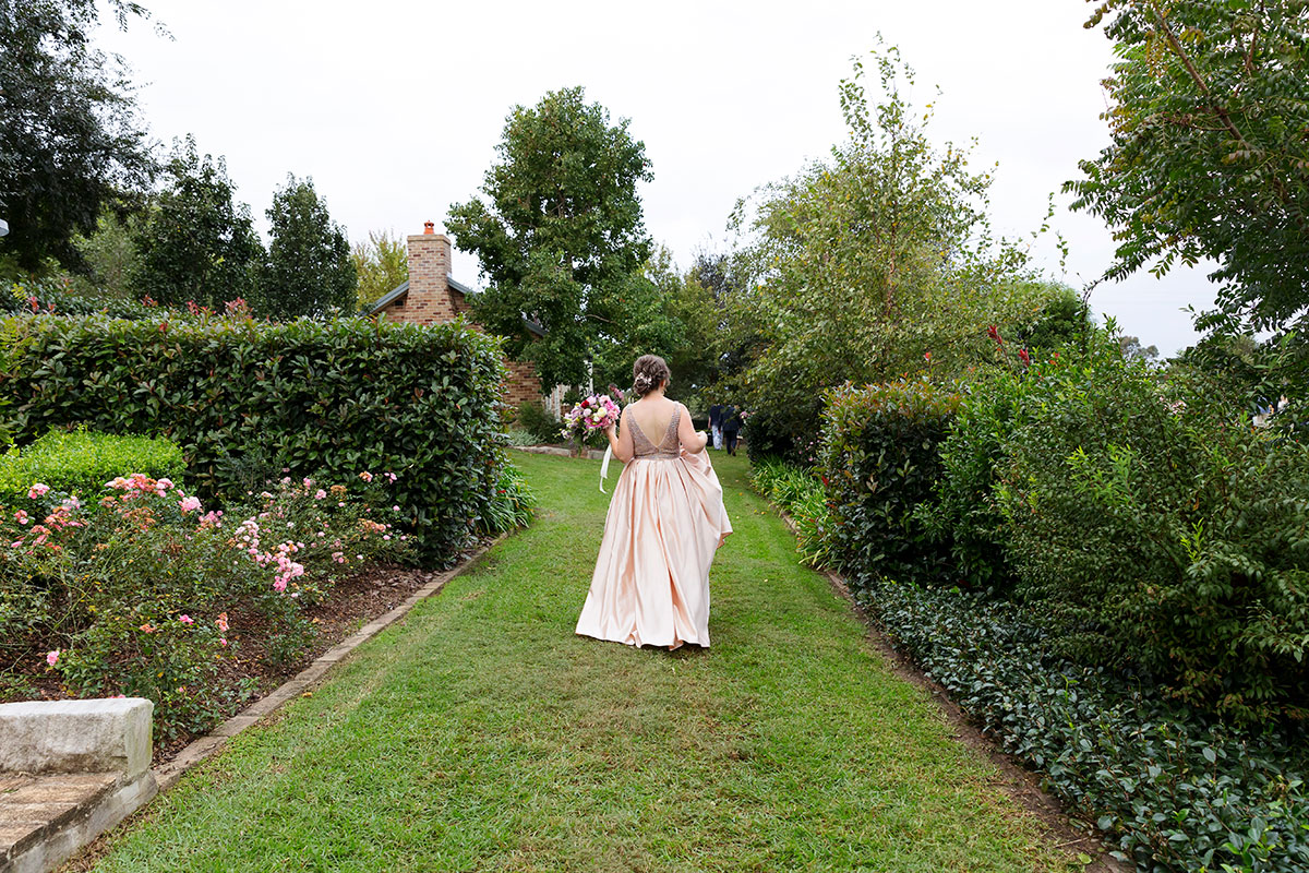 bride walking grounds at bath house garden