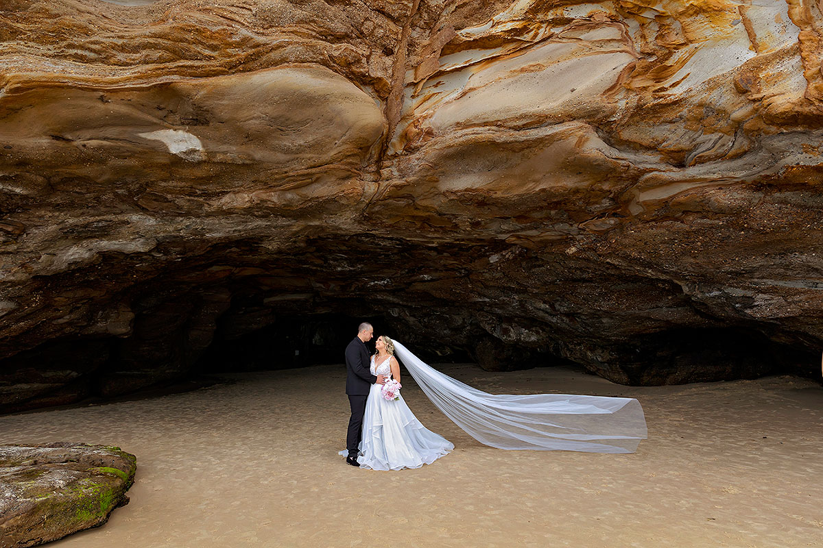 the cave at caves beach wedding
