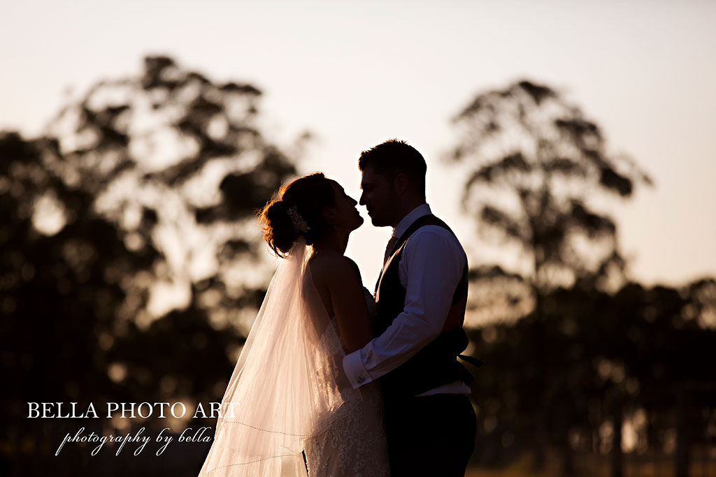 Ironbark hill wedding photos with a bride and groom at sunset