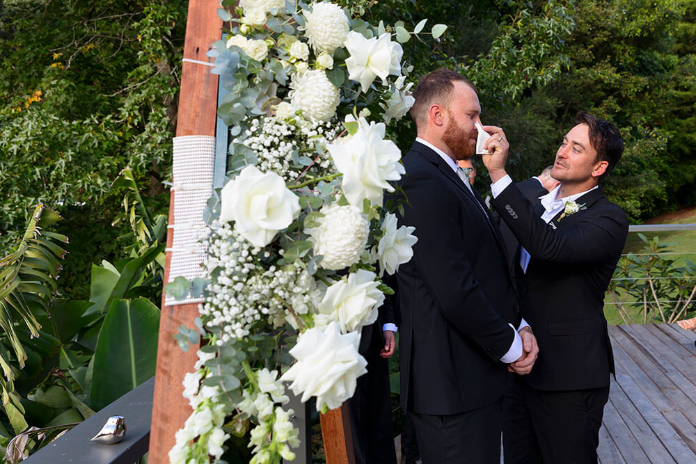 groom crying before the ceremony