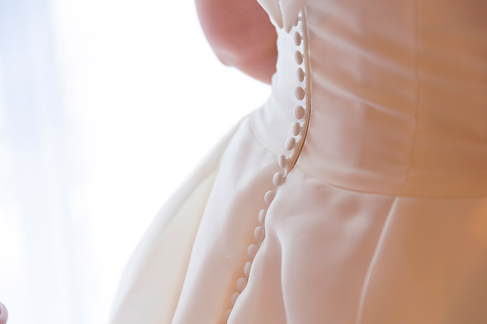 small button details on back of wedding dress