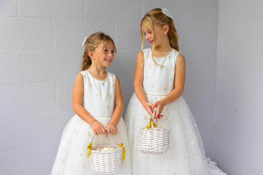 flower girls in white dresses