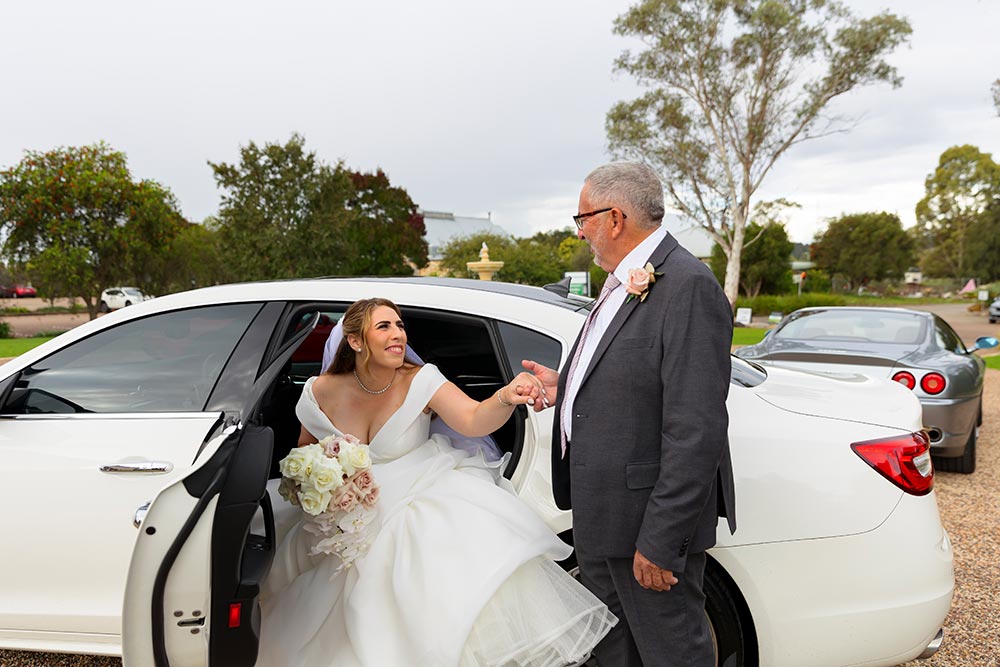 bride arriving at peterson house chapel