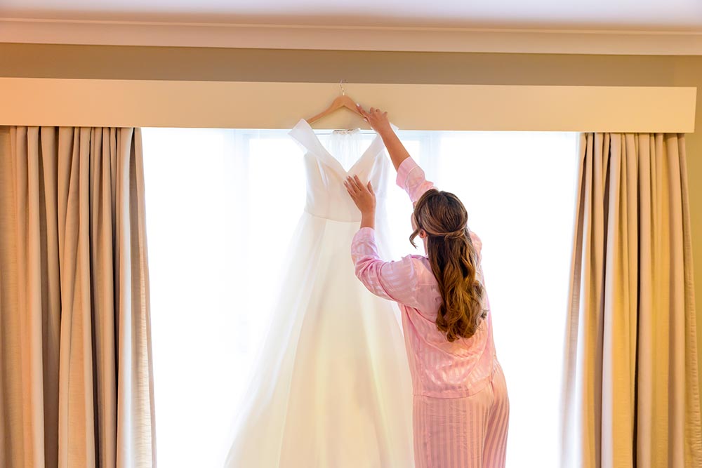 bride and wedding dress before getting dressed