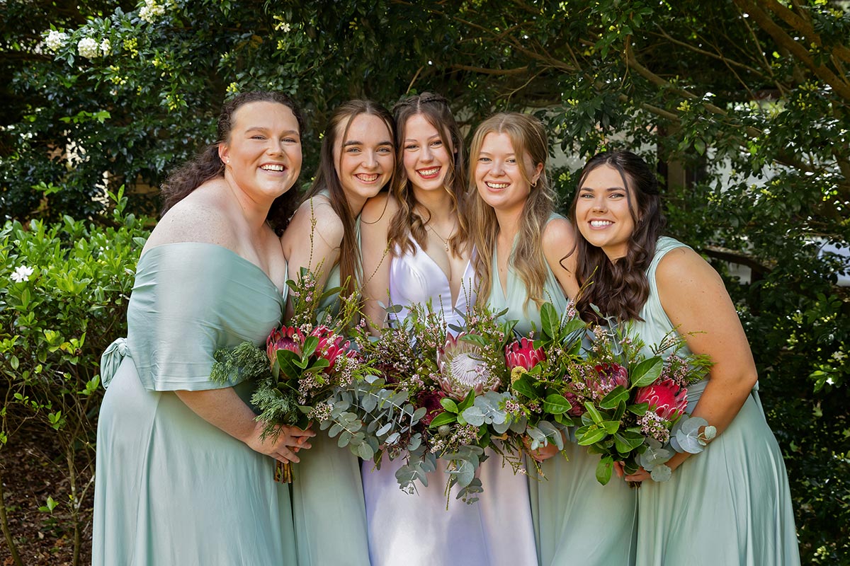 bride with bridesmaids tijuanas